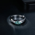 CARISSIE marquise moissanite bezel ring, top-down perspective emphasizing the geometric symmetry of the center stone