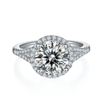 CARISSIE round moissanite halo engagement ring, top-down view showing the full halo circle and four-prong setting