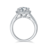 CARISSIE round moissanite halo engagement ring, side profile revealing the gallery rail and open bridge structure