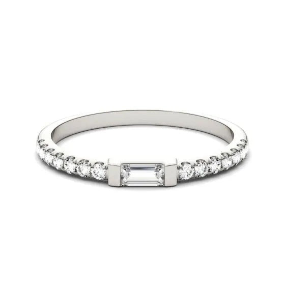 CARISSIE Baguette Moissanite Pavé Eternity Band, low angle shot emphasizing the ring's silhouette and polished metal finish