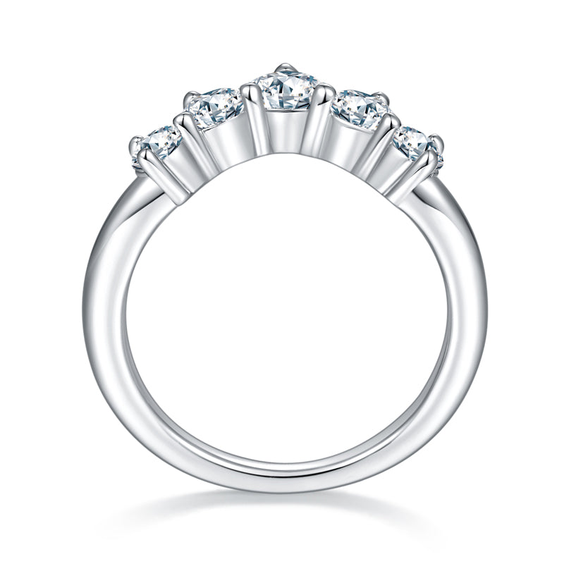 CARISSIE silver-tone moissanite band, top-down angle revealing the vertical metal prongs holding each gemstone in place