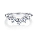 CARISSIE round moissanite eternity ring, front perspective displaying the symmetrical arch of five brilliant-cut stones