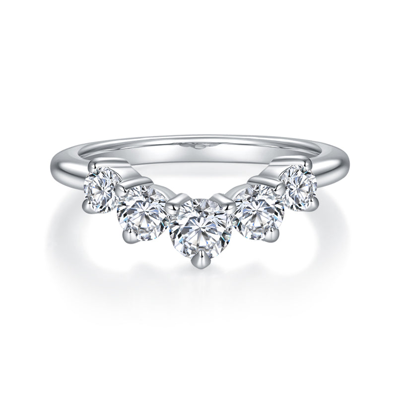 CARISSIE round moissanite eternity ring, front perspective displaying the symmetrical arch of five brilliant-cut stones