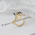 CARISSIE pavé statement ring, side profile of yellow gold version highlighting curved stone details