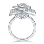 CARISSIE round moissanite ring, side profile revealing the three-dimensional petal structure and smooth metal shank