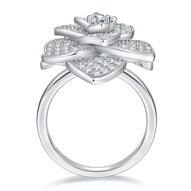 CARISSIE round moissanite ring, side profile revealing the three-dimensional petal structure and smooth metal shank