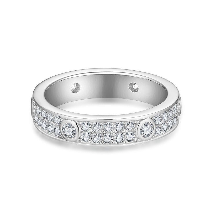 CARISSIE round moissanite eternity band, front view displaying continuous double row of small stones with larger accents