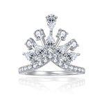 CARISSIE round moissanite pavé engagement ring front view, displaying the symmetrical crown-like setting of mixed stones