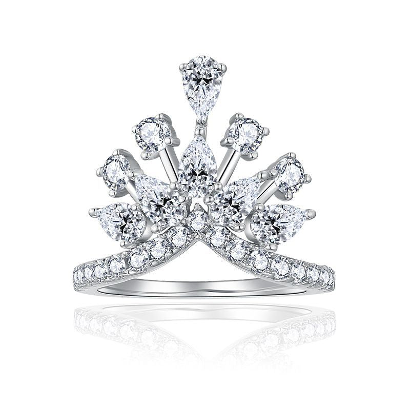 CARISSIE round moissanite pavé engagement ring front view, displaying the symmetrical crown-like setting of mixed stones