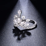 CARISSIE round moissanite pavé engagement ring angled close-up, revealing the depth of the multi-level pear and round stones