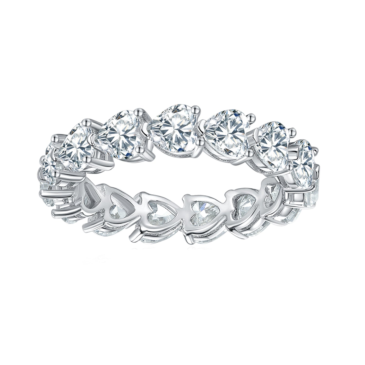 CARISSIE heart moissanite eternity band, angled view showing openwork gallery with heart-shaped cutouts in silver-tone metal