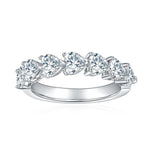CARISSIE Heart Moissanite Eternity Band, front view displaying heart-shaped stones set in polished silver-tone prongs
