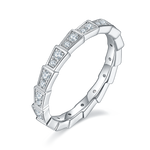CARISSIE moissanite eternity band, angled view showing segmented links with channel-set white stones