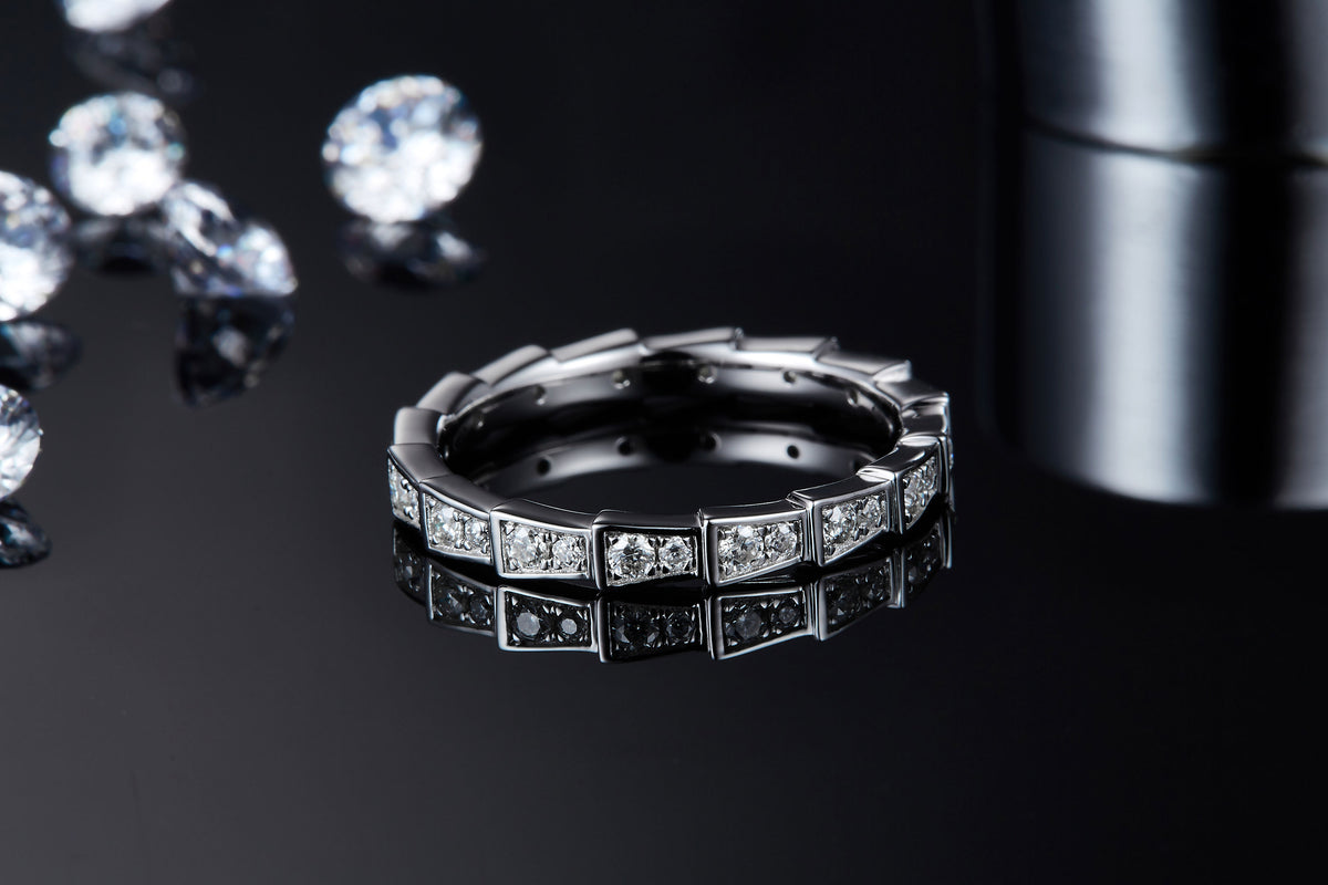 CARISSIE moissanite eternity ring, close-up perspective highlighting polished silver-tone finish