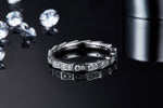 CARISSIE moissanite eternity ring, close-up perspective highlighting polished silver-tone finish