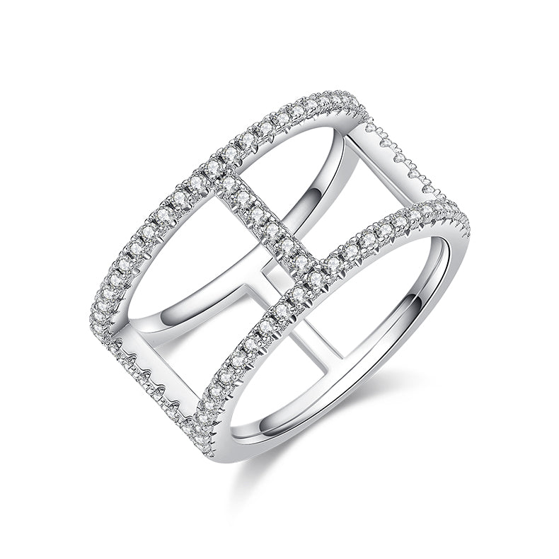 CARISSIE round moissanite pavé statement ring, angled view highlighting the geometric openwork cage and sparkling stone frame