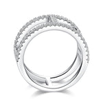 CARISSIE round moissanite pavé statement ring, side profile showing the smooth polished interior shank contrasting the encrusted exterior