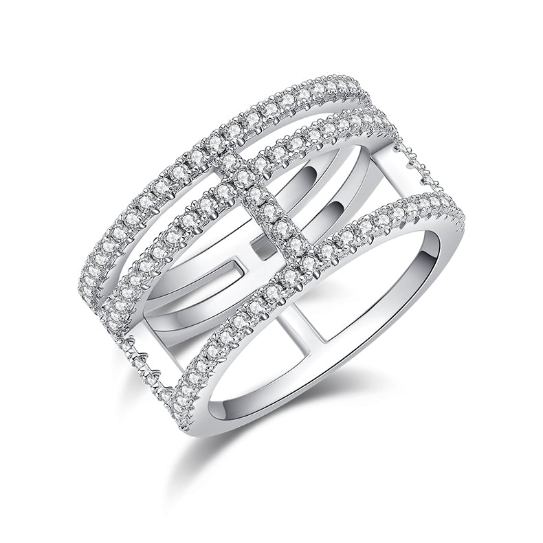 CARISSIE round moissanite pavé statement ring, angled view showing geometric open-work design and three parallel stone bands