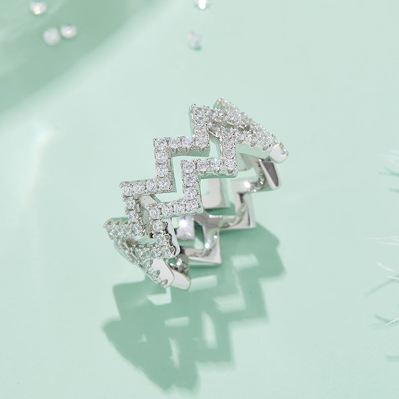 CARISSIE round moissanite pavé statement ring, close-up side angle emphasizing the depth of the pavé-set stones