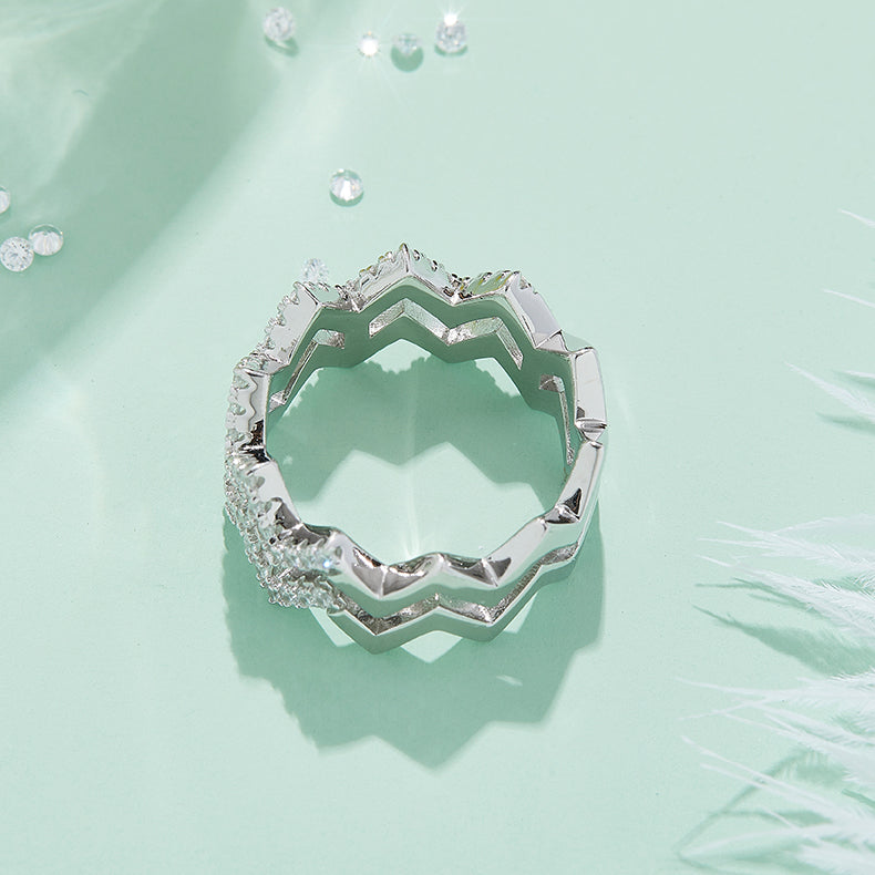 CARISSIE round moissanite pavé statement ring, top-down view showcasing the architectural openwork silhouette against a styled background