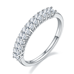 CARISSIE round moissanite eternity band, angled view highlighting continuous row of brilliant stones in four-prong setting