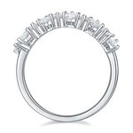 CARISSIE round moissanite eternity band, interior view showcasing smooth silver-tone band and open under-gallery design