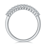 CARISSIE eternity band, top-down view showing the continuous row of rectangular moissanite stones set in silver-tone metal