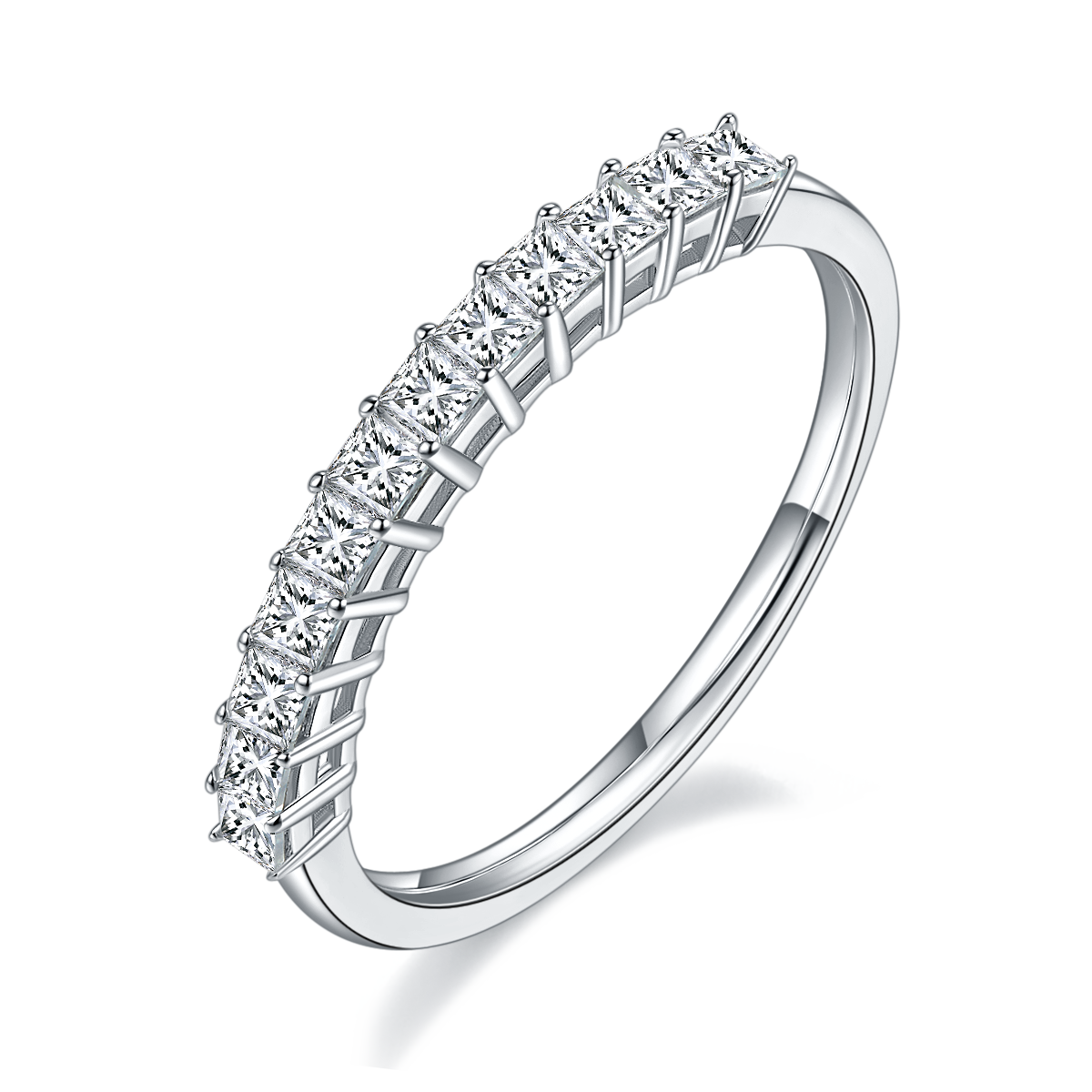 CARISSIE Princess Moissanite Eternity Band, angled view highlighting the high-polish silver-tone shank and four-prong setting details.