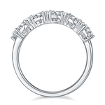 CARISSIE round moissanite eternity band, interior view displaying the smooth metal underside and gallery rail details.