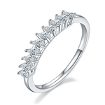 CARISSIE round moissanite solitaire ring, side profile view highlighting the high-profile prong setting and polished silver-tone band