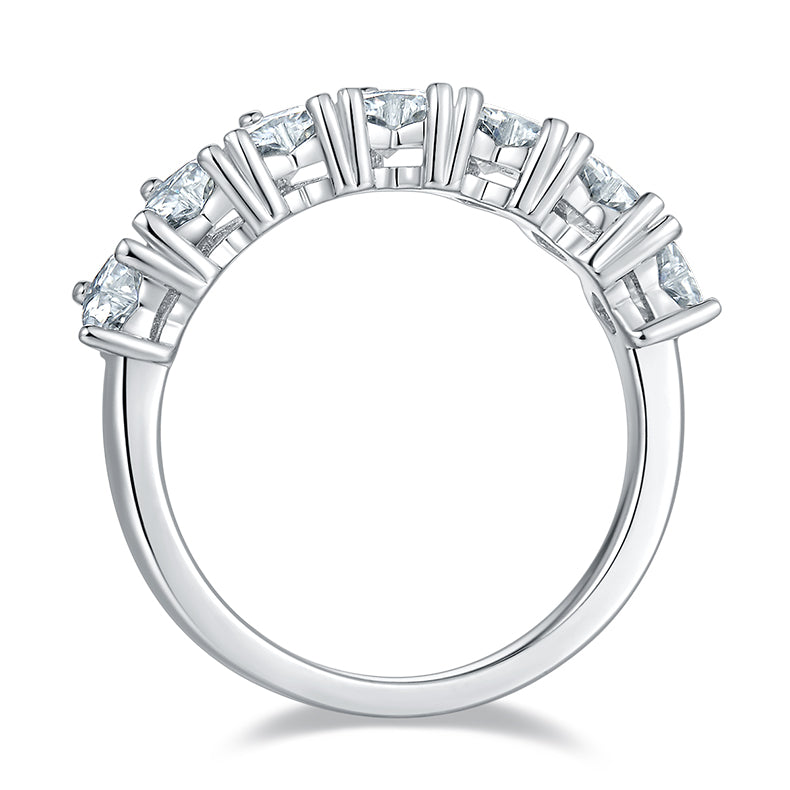 CARISSIE heart moissanite eternity band, top-down perspective revealing the uniform arrangement of stones and geometric metal bars.