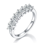 CARISSIE princess moissanite eternity band, angled view showing square stones and elevated prong setting details