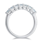 CARISSIE princess moissanite eternity band, top-down view highlighting the open-work metal bars between stones