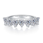 CARISSIE heart moissanite eternity band, front profile displaying continuous row of heart-shaped stones with delicate prong tips
