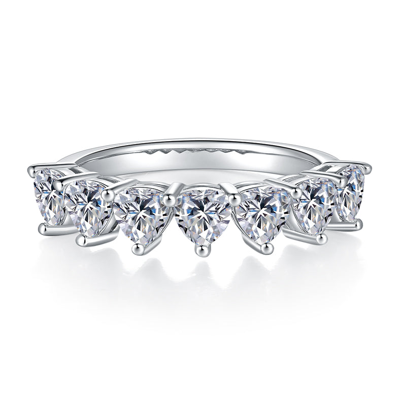 CARISSIE heart moissanite eternity band, front profile displaying continuous row of heart-shaped stones with delicate prong tips