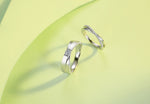 CARISSIE round moissanite pavé eternity band set, artistic shot on lime green background highlighting split-shank design