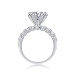 CARISSIE round moissanite solitaire ring, top-down view revealing gallery accents and central accent stone beneath head