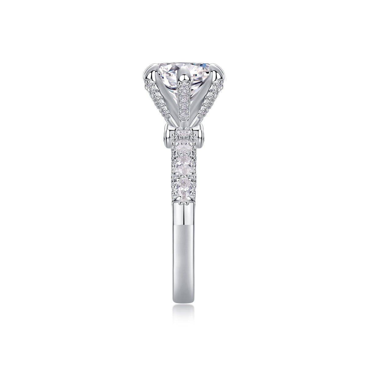 CARISSIE round moissanite solitaire ring, side profile showing high-profile crown motif and textured band encrustation