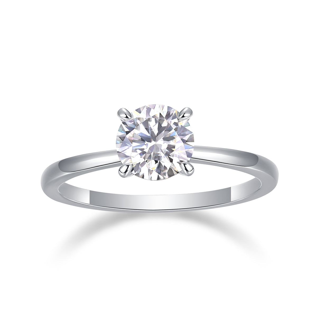 CARISSIE round moissanite solitaire ring side profile view in white gold, showcasing sleek band tapering toward four-prong setting