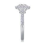 CARISSIE round moissanite halo engagement ring, vertical side angle displaying tapered band and continuous row of accent stones