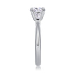 CARISSIE cushion solitaire engagement ring, direct side profile revealing the smooth shank and height of the stone setting
