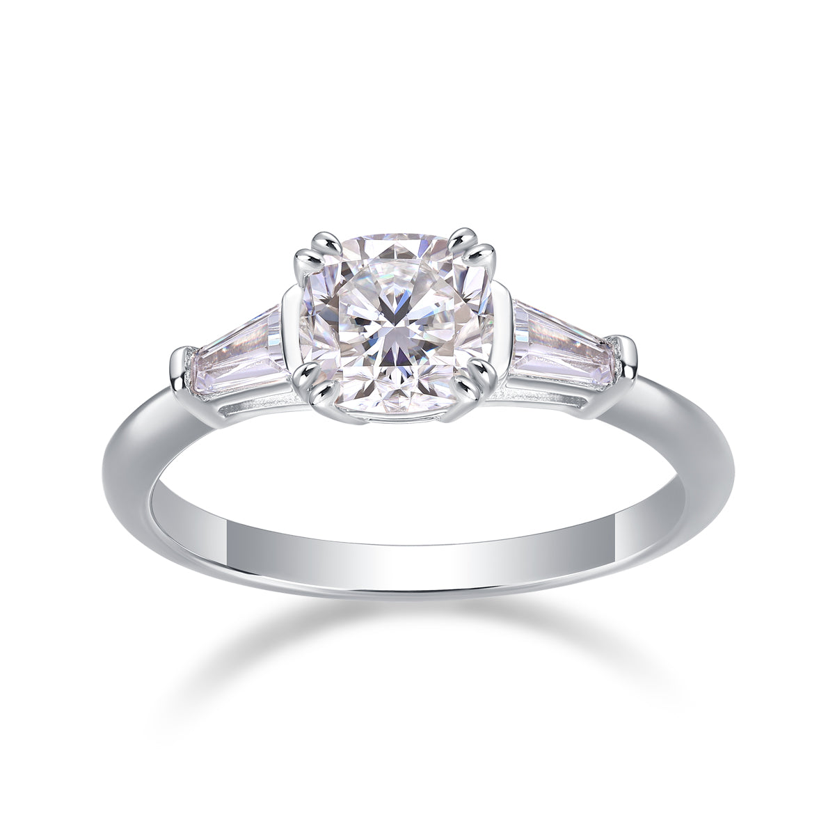 CARISSIE cushion solitaire engagement ring, front view displaying the symmetrical three-stone arrangement in polished silver-tone metal