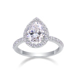CARISSIE pear moissanite halo ring, angled front view highlighting large center stone and round accent stones in silver setting