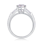 CARISSIE pear moissanite ring interior profile, revealing the smooth silver band and pavé-set round stones along the shoulders