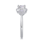 CARISSIE round moissanite halo engagement ring side profile, showcasing tapered band and shoulder stone clusters