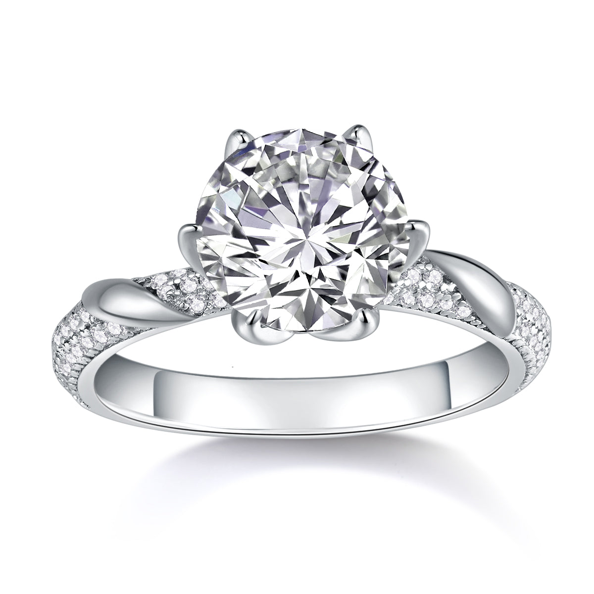 CARISSIE round moissanite solitaire ring front profile displaying symmetrical metal curves and rows of small accent stones