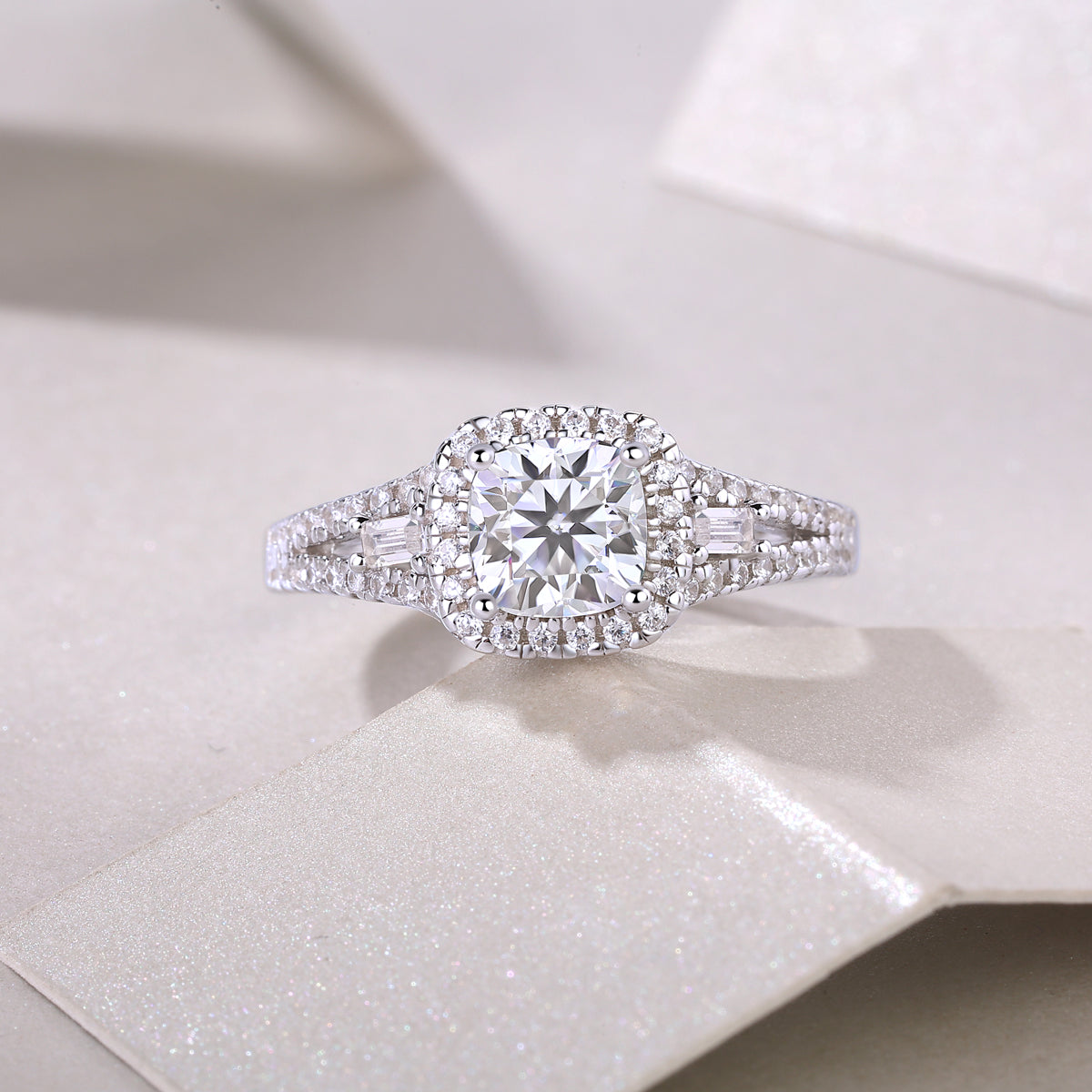 CARISSIE cushion moissanite halo ring top-down view, capturing full brilliance of center stone and symmetrical double halo