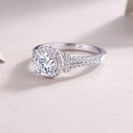 CARISSIE round moissanite engagement ring three-quarter view emphasizing the double row of diamonds along the split band