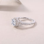 CARISSIE round moissanite ring close-up, clearly showing the S925 hallmark inside the band and intricate metalwork