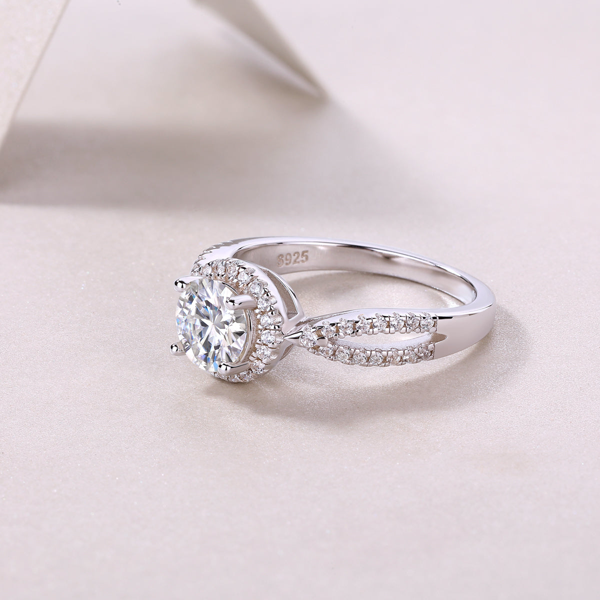 CARISSIE round moissanite halo ring, close-up of inner band revealing S925 hallmark and smooth polished metal finish